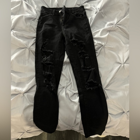 American Eagle black ripped “next level stretch” skinny jeans. Size 00 - Picture 7 of 7